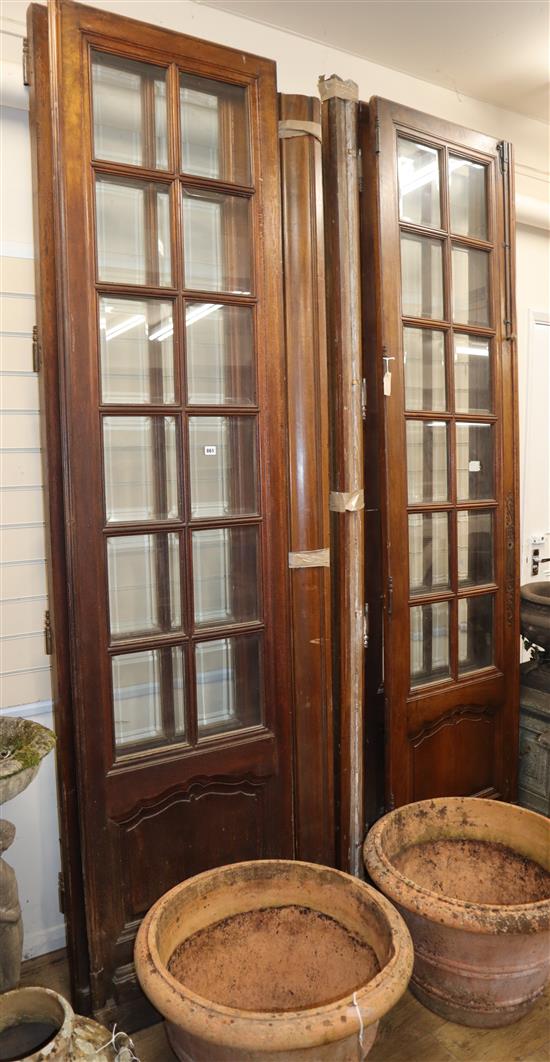 A set of four 19th century French glazed bookcase doors H.270cm